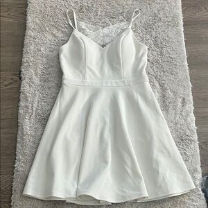 Elegant White Lace-Trimmed Dress